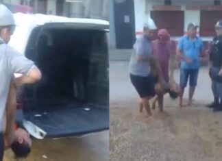 Vídeo mostra população de Manacapuru imobilizando e jogando suspeito na viatura da PM; assista