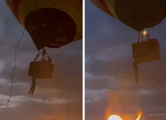 Assistente de piloto fica pendurado e cai de balão; veja o vídeo